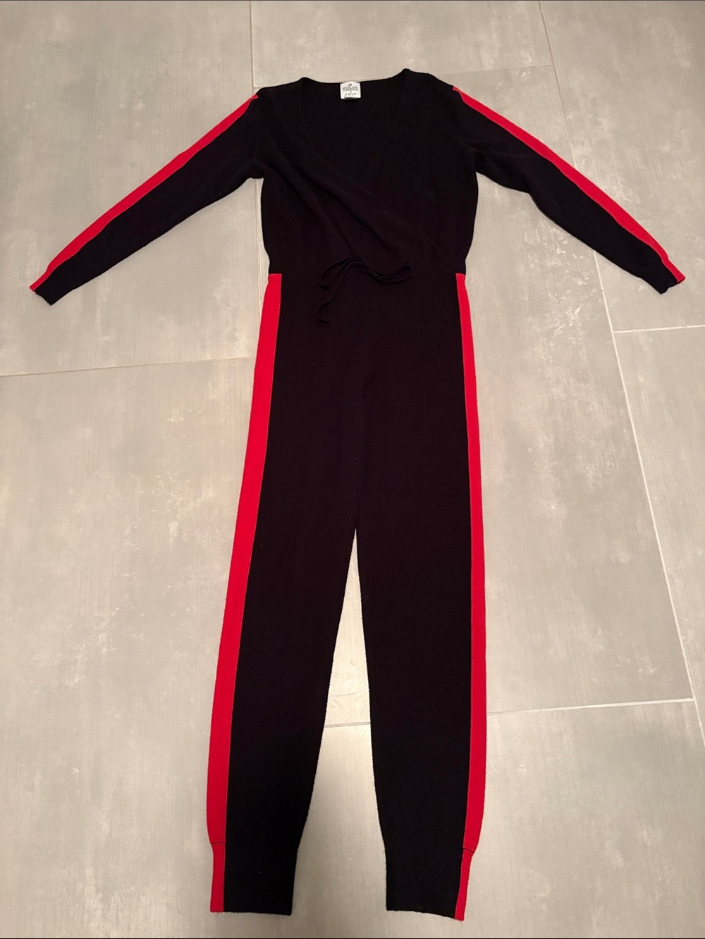 MADELEINE THOMPSON x AQUA Black Jumpsuit with Red Side & Sleeve Stripes